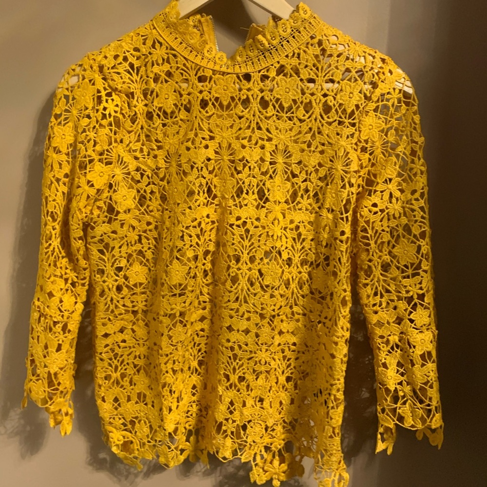 Bold elements lace top
